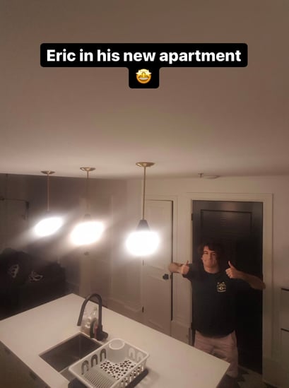 Eric in his new apartment